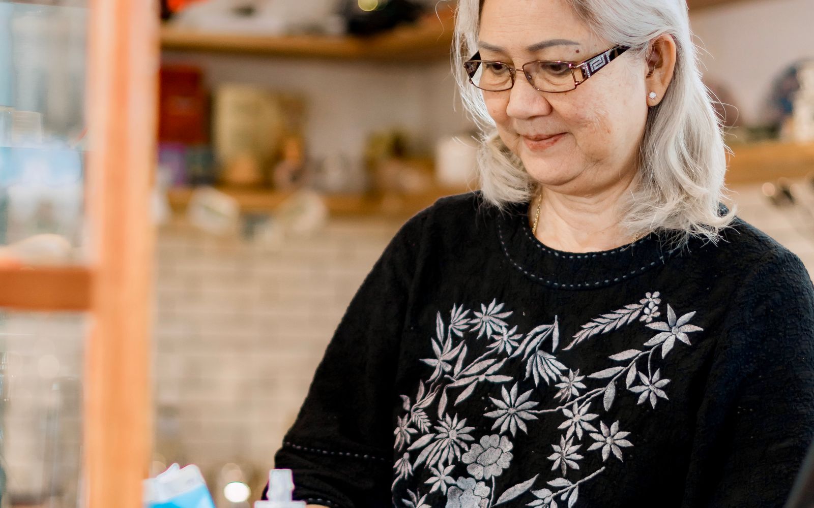 Independent senior relaxing comfortably and confidently in a bright home